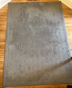 lot 31 image: Used Beige Area Rug with Chevron Pattern
