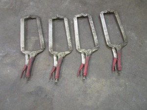 lot 21 image: (4) 11 Clamps