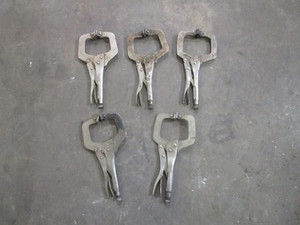 lot 24 image: (5) 4 Clamps