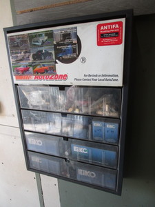 lot 89 image: Wall Cabinet of Automotive Bulbs & Air Brake Fittings