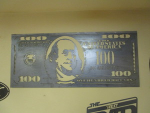 lot 109 image: $100 Steel Sign 20x47