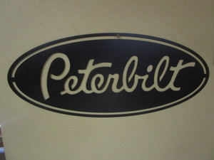 lot 114 image: Peterbilt Steel Sign 10x24