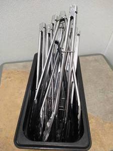 lot 99 image: Bin of Heavy Duty Tongs
