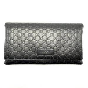 lot 48 image: Gucci Black Guccissima Continental Leather Wallet Pre-Owned Retail $500
