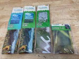 lot 99 image: Lot of 4 - Garden Flags