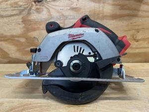 lot 12 image: Milwaukee M18 18V Lithium-Ion Cordless 6-12 in. Circular Saw Model # 2630-20 - Tool-Only