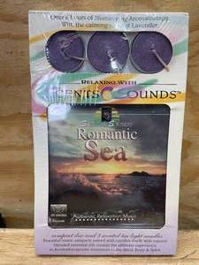 lot 133 image: CD of Relaxing Music and 3 Scented Candles