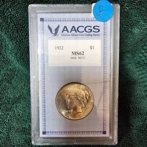 lot 8 image: 1922 Peace Dollar AACGS MS62 wDark Rim Toning