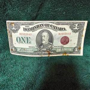lot 24 image: 1923 $1 Canada Purple Seal Large Note