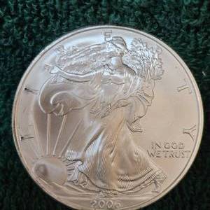 lot 34 image: 2006 Silver Eagle UNC, Fresh From Roll