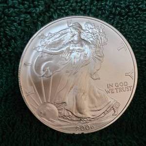 lot 35 image: 2006 Silver Eagle UNC, Fresh From Roll