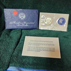 lot 57 image: 1973 Eisenhower Silver Silver Dollar UNC not copper