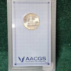 lot 87 image: 1976-S Kennedy Silver 50c MS64