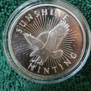 lot 153 image: Sunshine Minting 1 oz Round
