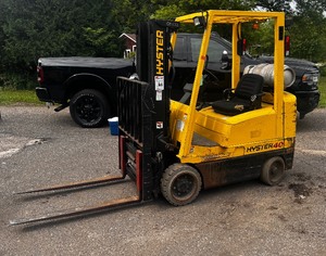 lot 20A image: Hyster Forklift With low hours, has new wiring, has side Shifting Forks, works great LP gas. With owners manual