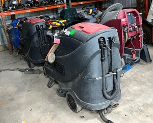 lot 46 image: 1 Nobles Speed Scrub Rider, 1 RoboScrub Brain OS ModelBE-MK2A-MR20 MINUTEMAN works but needs battery, 2 Viper Model AS710R both Work but need batteries, Clarke walk Focus Boost II, Advance SC900, Kaivac KV17501DC
