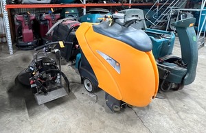 lot 47 image: 8 Floor Scrubbers, see description for working Scrubbers. 2 RoboScrub Minuteman Brain OS ride on, VIPER WALK BEHIND, Taski Swingo XP, 2 Nobles Speed scrub riders, Tennant T600, pioneer eclipse SAFR technology floor scrubber