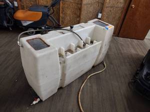 lot 104 image: Wheel Well Tank 110 Gallons.