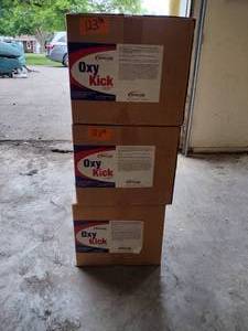 lot 123 image: 12 Gallons of New Line Oxy Kick Oxygen Booster PH Booster. 3 boxes of Four 1 Gallon Jugs.