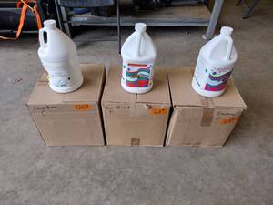 lot 128 image: 3 Boxes of 4 1 Gallon Jugs. Assorted Soap Daddy Deodorizers