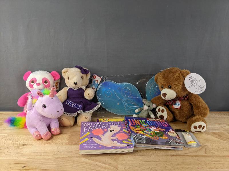 lot 245 image: New FairyButterfly Costume Wings, Assorted Plush Animals, and Board Books B