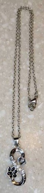 lot 437 image: New Stylish Mobias Cat Claw Necklace Silvery P