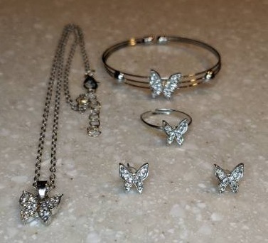 lot 444 image: New Five Piece Butterfly Jewelry Set Necklace Pierced Earrings Bracelet Adjustable Ring Silvery P
