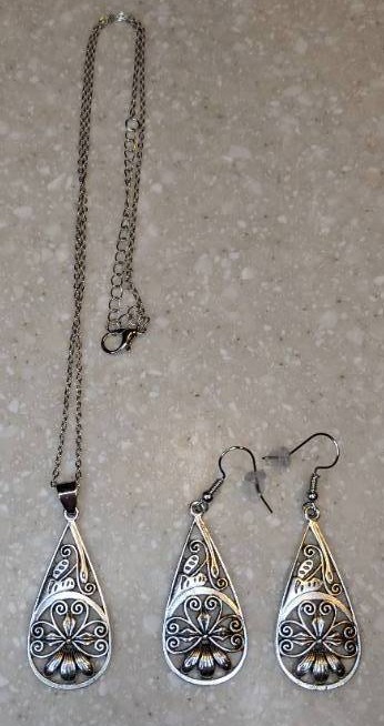 lot 446 image: New Cutout Pear Shaped Necklace And Pierced Earrings Silvery P