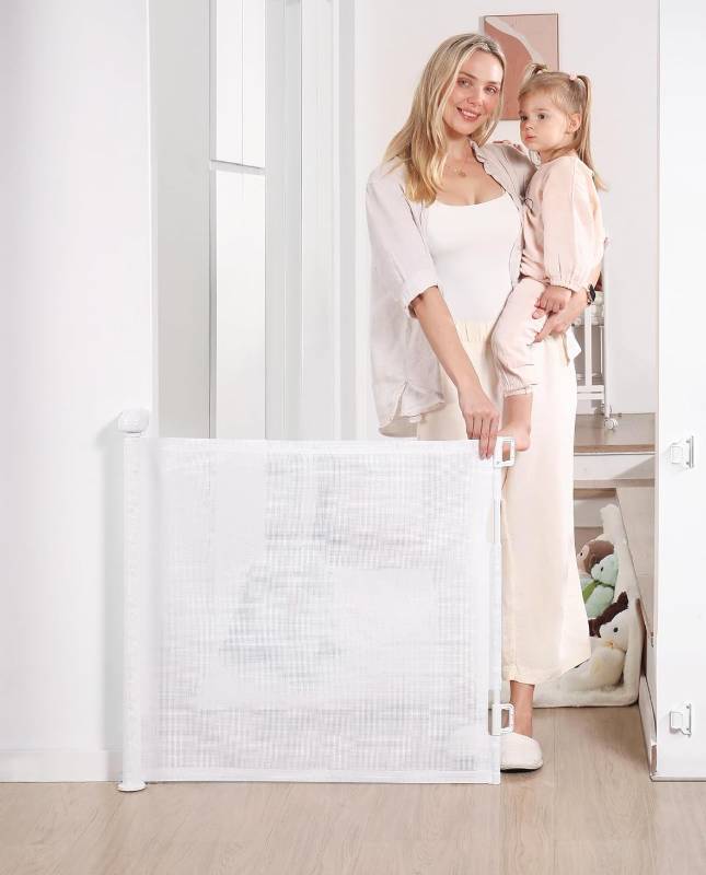 lot 104 image: Brand New Likzest Retractable Baby Gate $49.99 Retail B