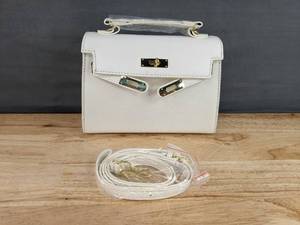 lot 70C image: Brand New White Leather Crossbody Handbag with Gold Accents and Detachable Strap N