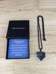 lot 115 image: Brand New Chrishine Life Black Pendant Necklace with American Flag Plate Design N