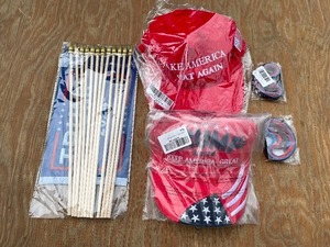 lot 44A image: 2 Brand New Donald Trump Make America Great Again Hats, 12 Flags and 10 Rubber Wristbands N