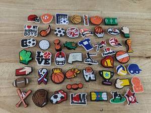 lot 86H image: 50 Brand New All the Sports Character Croc Charms N