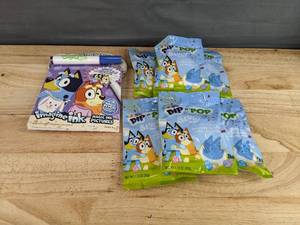 lot 256 image: Brand New Bluey Imagine Ink Book and 5 Bluey Dip n Pop Candy N