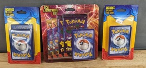 lot 21H image: 2 Brand New Pokmon 20 Card Plus Promo Blister Packs and Pokmon Trading Cards Lightning Set N