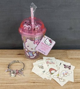 lot 82H image: Brand New Hello Kitty Set Tumbler with Candy Sticks, Hello Kitty Charm Bracelet & 40 Hello Kitty & Friends Temporary Tattoos N