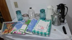 lot 61 image: Vintage Elvis, Cotton Tablecloths and More.