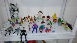 lot 63 image: Assorted Action Figurines. Disney, Smurfs, Sesame Street, Toy Story.