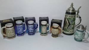 lot 104 image: Avon Collectible Mini Steins (6) and Large