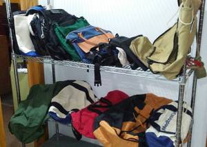 lot 11 image: Huge Collection Of Duffels, Fanny Pack, Backpack And More.