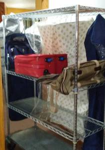 lot 12 image: Samsonite Luggage, Clothing Bags And Closet Hanging Organizers.