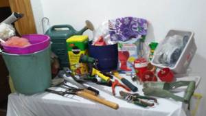 lot 16 image: Garden Variety Pruner, Trimmer, Hooks, Miracle Grow And More.