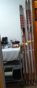 lot 19 image: Vintage Cross Country Boots Skis And Poles (2 Sets).