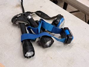 lot 242 image: Lot of (4) Assorted Hand Tools - Flashlights (x2) and Headlamps (x2)