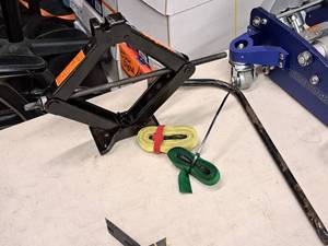 lot 252 image: Screw Jack, (2) Straps, (1) Lug Wrench