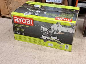 lot 203 image: Ryobi 10 Sliding Compound Miter Saw