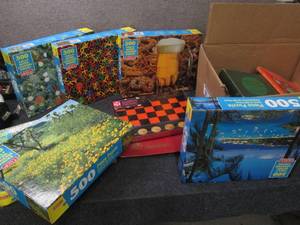 lot 299 image: New puzzles nd interesting books...