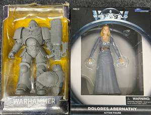 lot 15 image: West World Dolores Abernathy & War Hammer 40,000 Action Figures