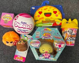 lot 45 image: Sensory Toys Taco, Zuru Snackles Teanie Tots, Slime, Squishy Dumpling, And Keychain & More Toy Lot