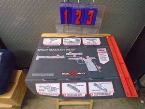 lot 123 image: M&P smart mat. As shown.